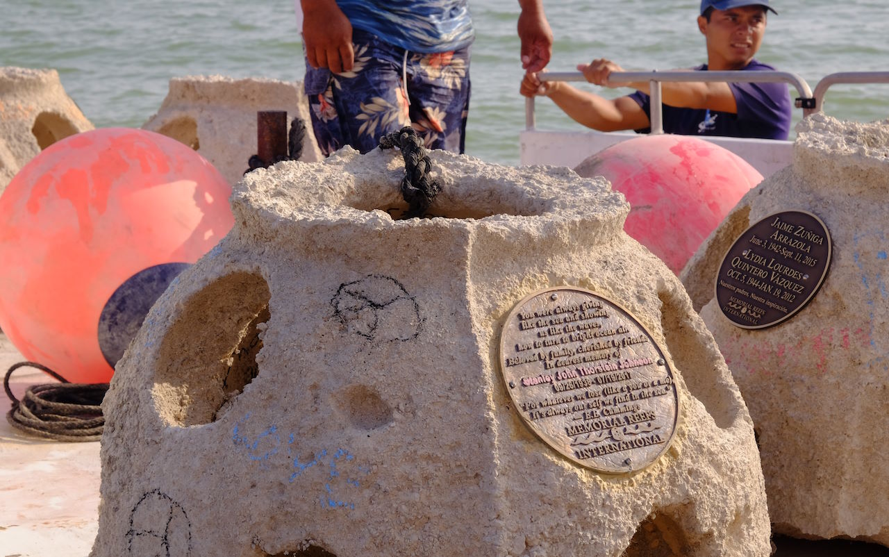 reef balls with bronze placards near Merida